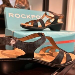 New In Box
Black leather Rockport sandals with adjustable straps Sz 7